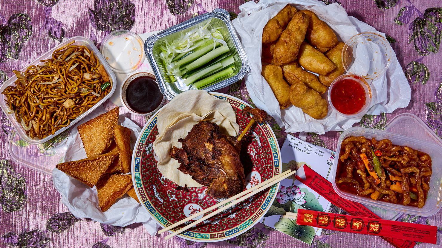 Crispy aromatic duck with pancakes, chow mein, sesame prawn toast and shredded chicken